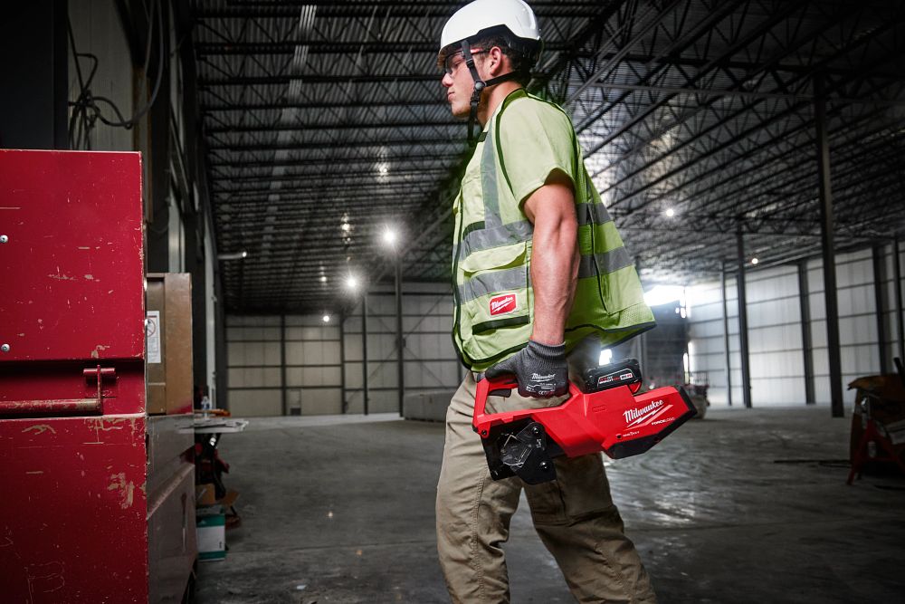 man carries Milwaukee Unistrut Cutter