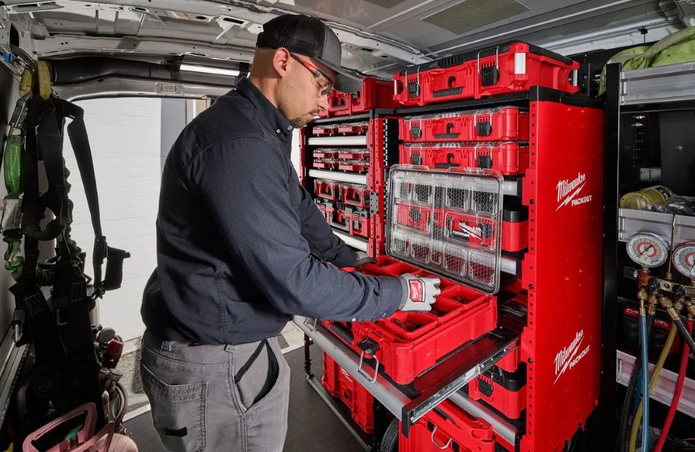 Man with Milwaukee Packout tray