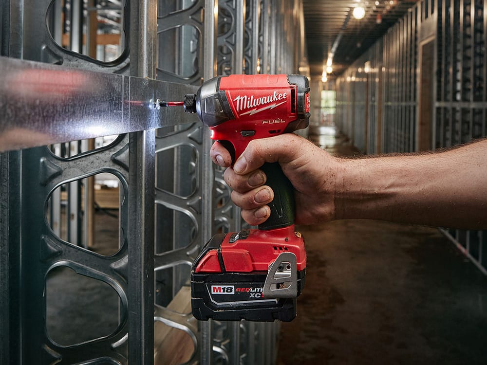 A Milwaukee Impact Driver in use