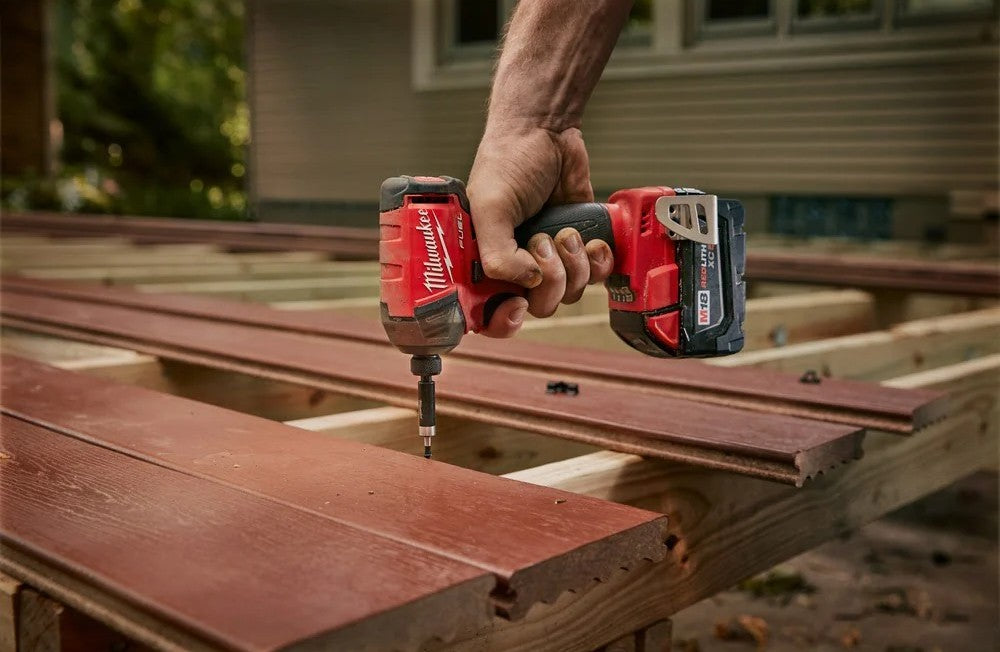 A Milwaukee Impact Driver in use